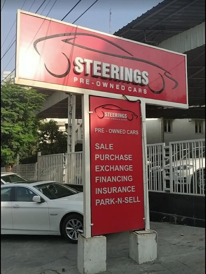 STEERINGS premium pre-owned car showroom